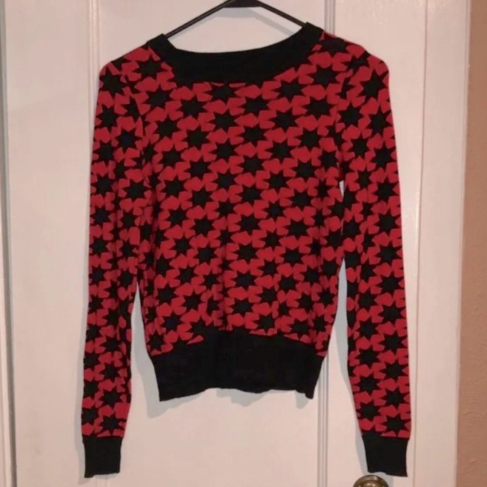 Black and red sweater with stars pattern